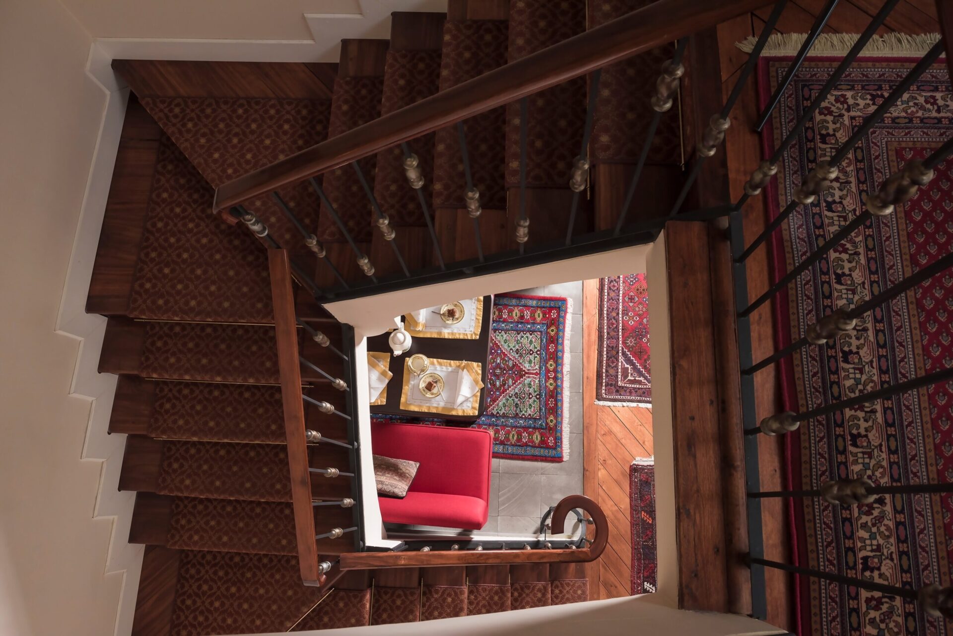 View of the staircase going down to the breakfast nook